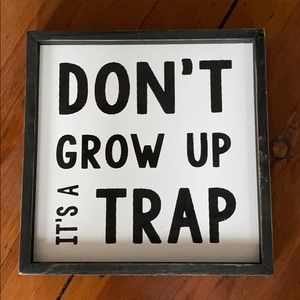 Don’t grow up it’s a trap wooden sign